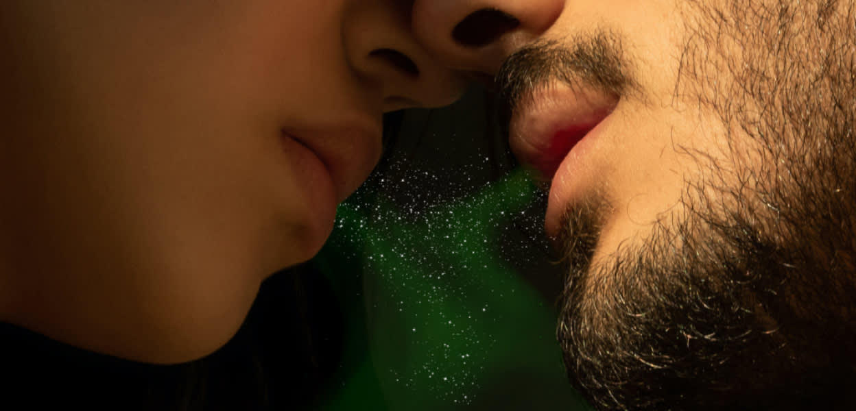 A close-up of a man and a woman leaning in for a kiss – Viome Oral Health Intelligence Test